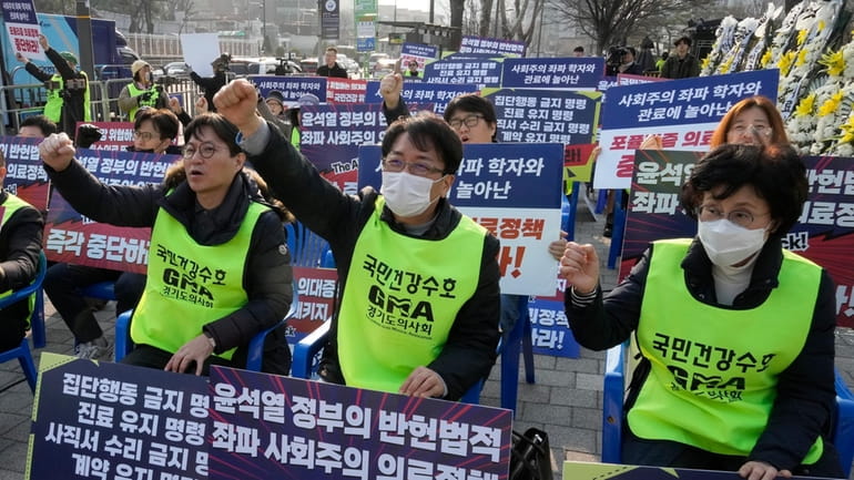 Members of the Gyeonggi Province Medical Association stage a rally...