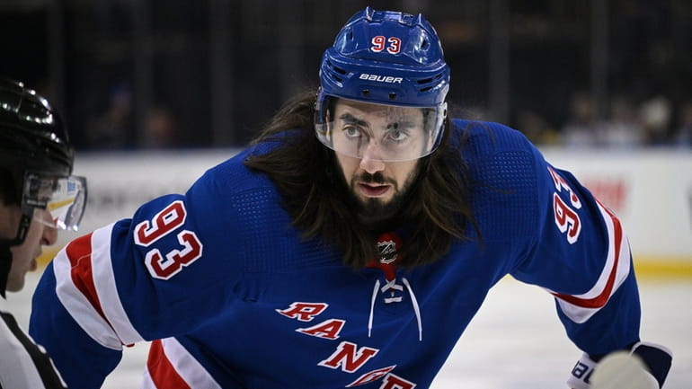 Rangers center Mika Zibanejad looks on before a face off...