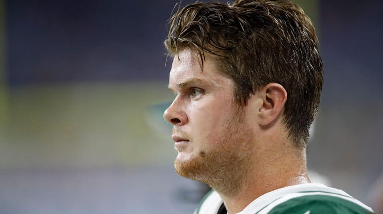 Sam Darnold #14 of the Jets looks on during the...