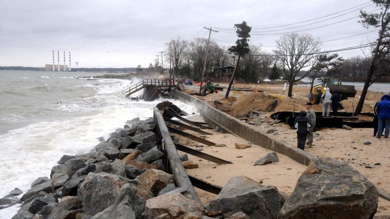 Waves crash over collapsed seawall in Asharoken. (March 15, 2010)
