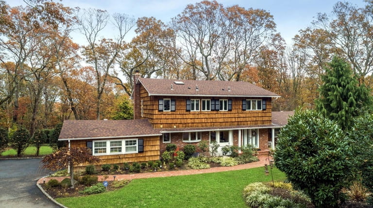 This four-bedroom, four-bathroom Colonial in Fort Salonga is listed for $769,000.
