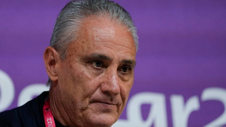 Brazil's head coach Tite attends a press conference on the...