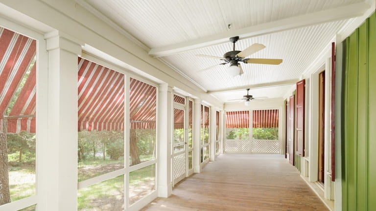 This Cutchogue home has an indoor-outdoor porch. 