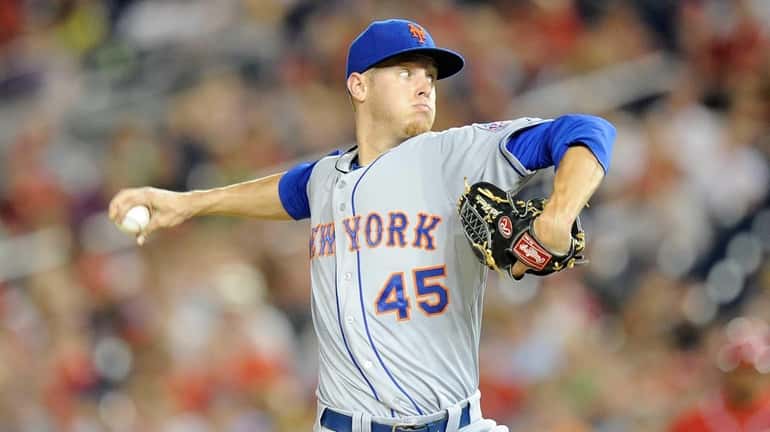 Zack Wheeler of the Mets pitches in the third inning...