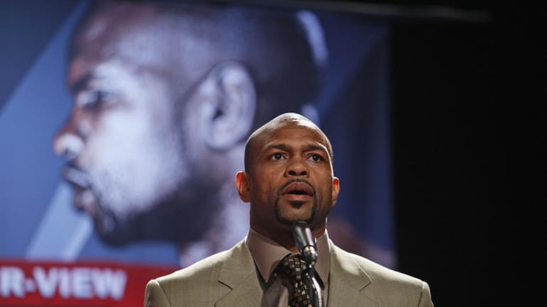 Boxer Roy Jones Jr. speaks to reporters during a news...