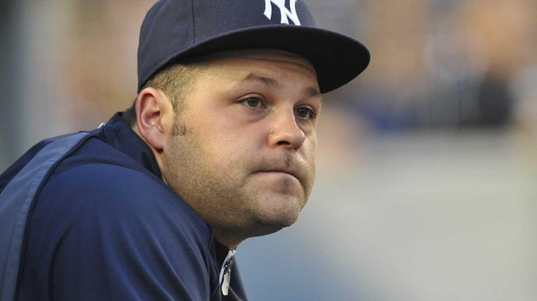 Joba Chamberlain watches the Yankees play the Red Sox from...