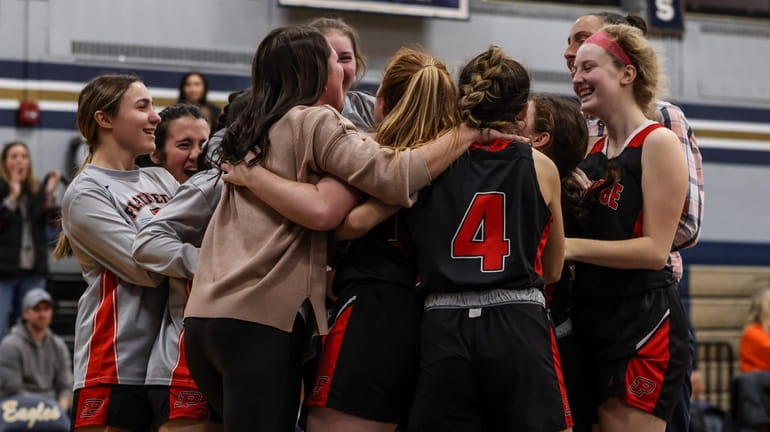 Plainedge celebrates its last minute 48-46 win over Bethpage after...