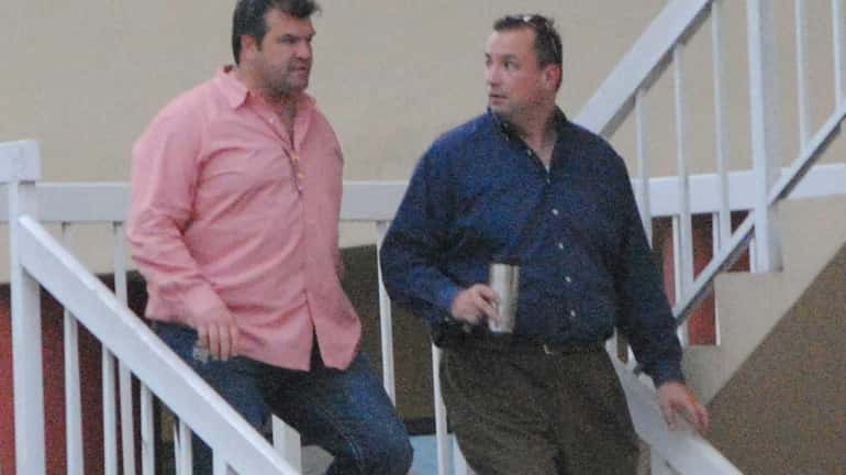 Joseph Romano, left, and David Mirkovic in a government surveillance...