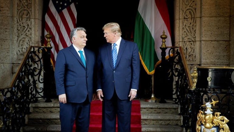 Hungarian Prime Minister Minister Viktor Orbán (L) and former President Donald...