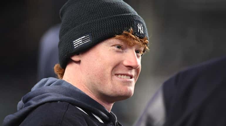 Yankees' Clint Frazier looks on in the dugout during an MLB...