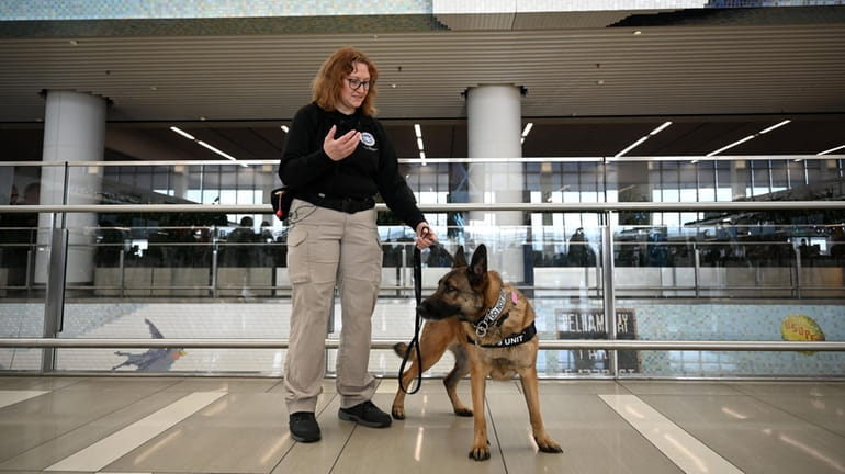 TSA canine handler Julie Guevara and her 6-year-old Belgian Malinois...