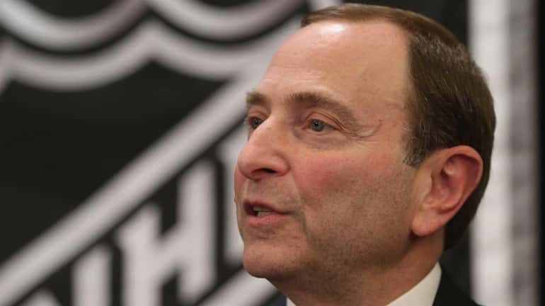 NHL commissioner Gary Bettman speaks with the media at a...