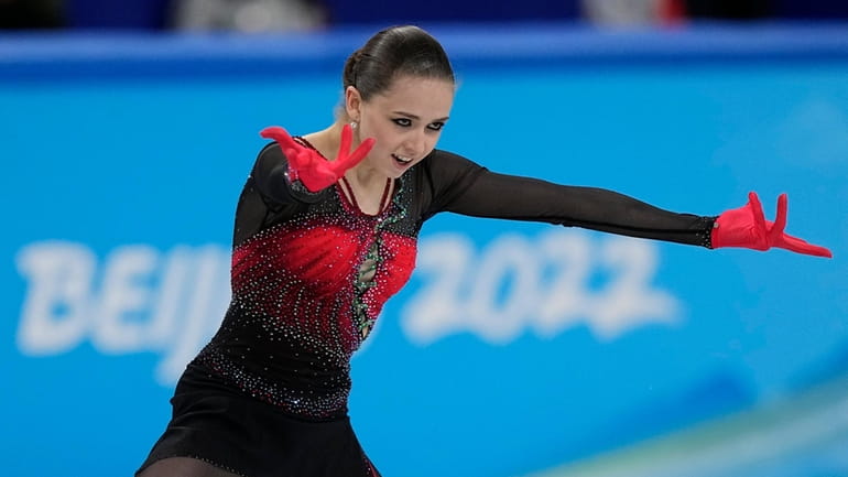 Kamila Valieva, of the Russian Olympic Committee, competes in the...