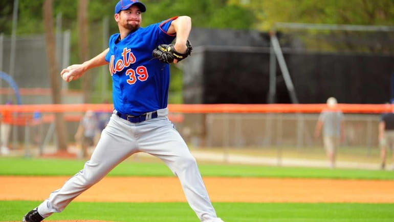 Bobby Parnell throws a live batting session during spring training....