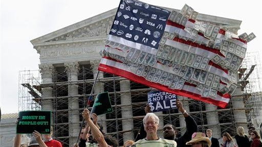 Demonstrators gather outside the Supreme Court in Washington, as the...