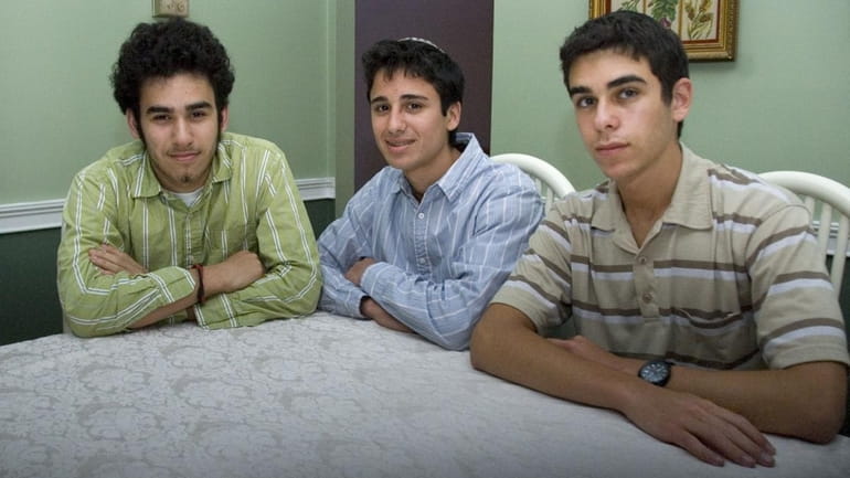 Entrepreneurs, from left, Gilad Katz, 17, George Bangiyev, 18, and...