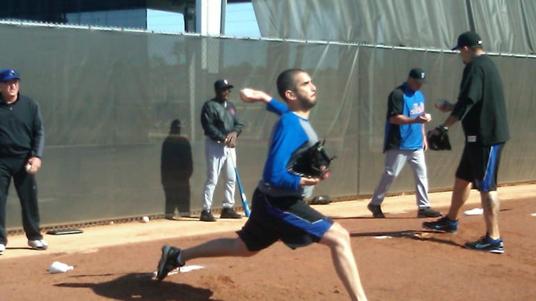 Oliver Perez throws at the Mets' spring training complex in...