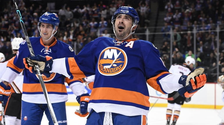 New York Islanders right wing Cal Clutterbuck (15) reacts after...