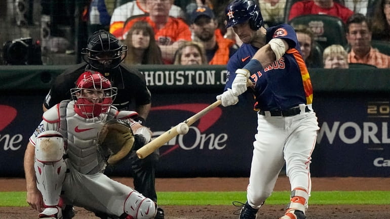 Houston Astros Alex Bregman hits a two-run home run during...