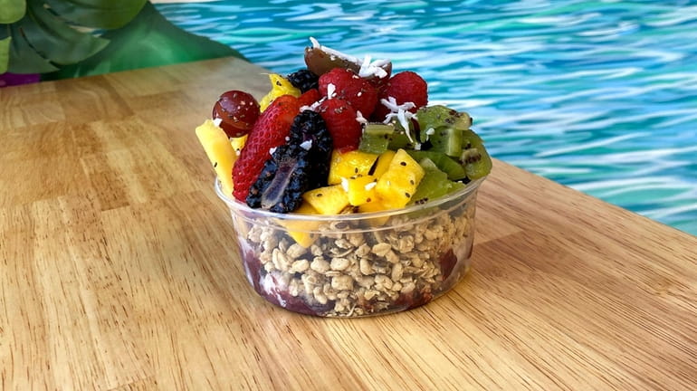 An açaí bowl at Purple Flamingo in North Bellmore comes...