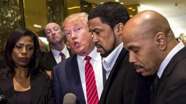 Donald Trump stands with a coalition of African-American evangelical pastors...