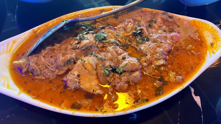 Dum ka murgh, a slow-cooked chicken dish at Jazeera, a...