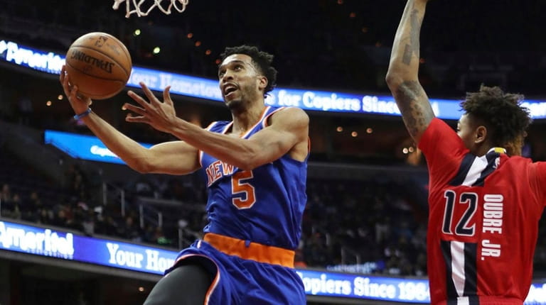 New York Knicks guard Courtney Lee drives for a layup...