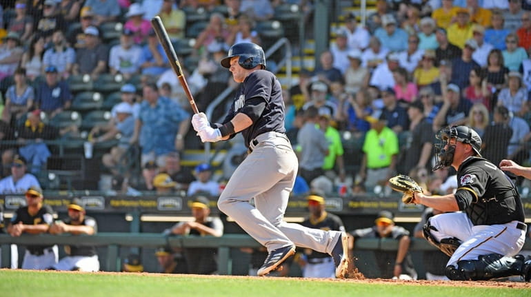 The Yankees' Clint Frazier knocks a single during a spring...