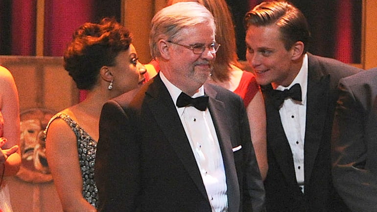 Playwright Christopher Durang appears on stage with producers to accept...