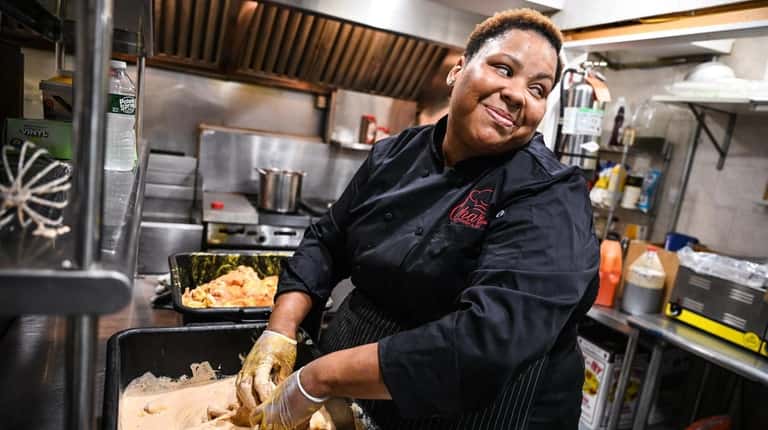 Cheryl Grigg, chef-owner of Chara's Kitchen and Catering in Bellport,...