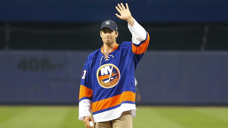 John Tavares of the Islanders waves before throwing out the...