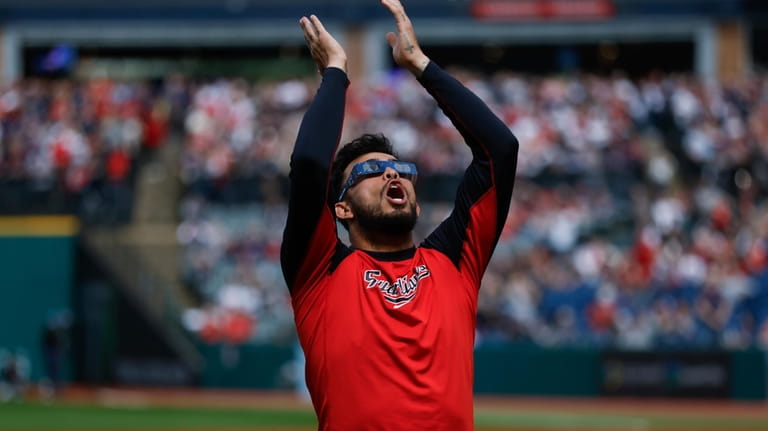 Cleveland Guardians third baseman Gabriel Arias uses special glasses to...