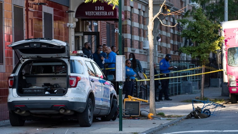 Several pedestrians were injured, after a marked NYPD cruiser from...