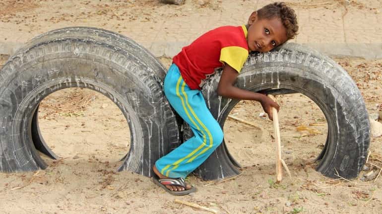 A Yemeni child, seen on Aug. 6, is among displaced...