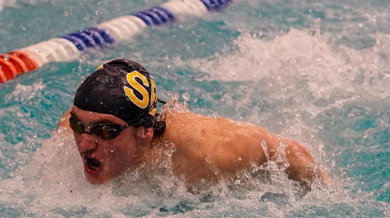 Nicholas Rhodes of South Side/Lynbrook swims the 100-yard butterfly during...