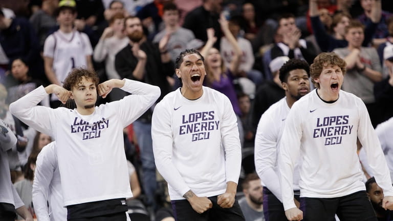 Grand Canyon players on the bench react during the second...