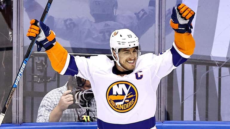 Anders Lee of the Islanders celebrates after scoring a goal against...