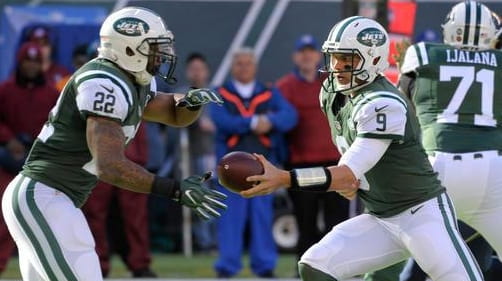 New York Jets quarterback Bryce Petty (9) hands off the...