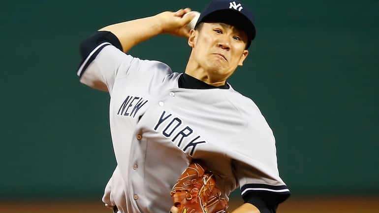 Masahiro Tanaka delivers a pitch against the Boston Red Sox...