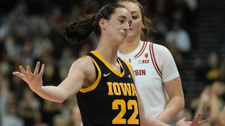 Iowa's Caitlin Clark reacts after her three pointer during the...