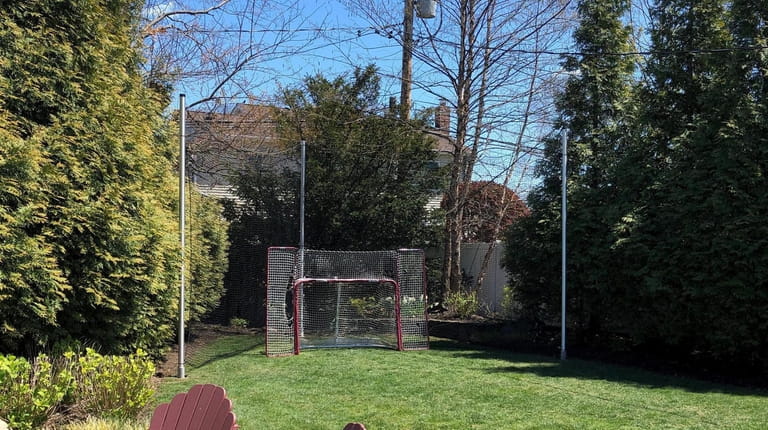 All Sport Netting sets a boundary for backyard game action.