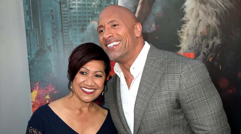 Actor Dwayne Johnson and his mother, Ata Johnson, attend the premiere...