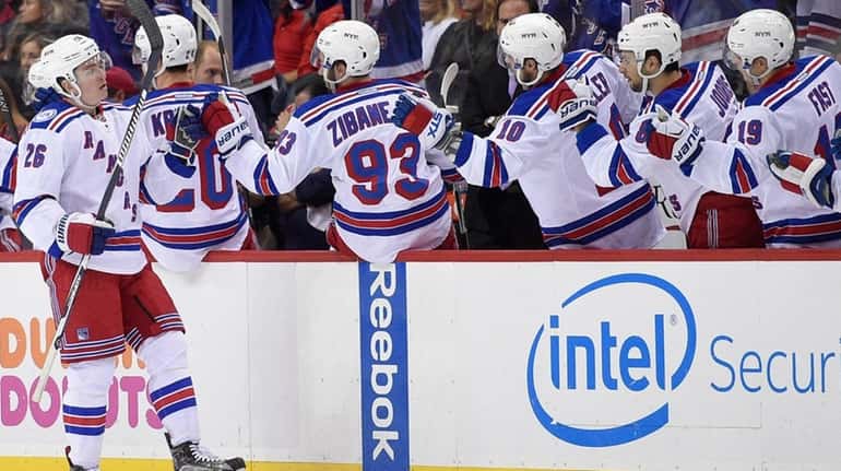 New York Rangers' left wing Jimmy Vesey (26) celebrates his...