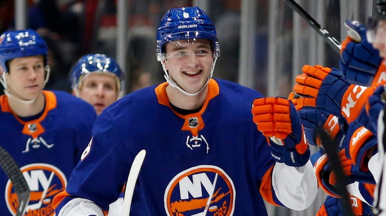 Noah Dobson of the Islanders celebrates his second period goal...