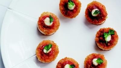 The Chicken Parmesan Lollipops recipe can be found in "Bite...