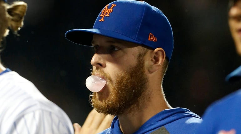 Zack Wheeler #45 of the Mets looks on against the San...