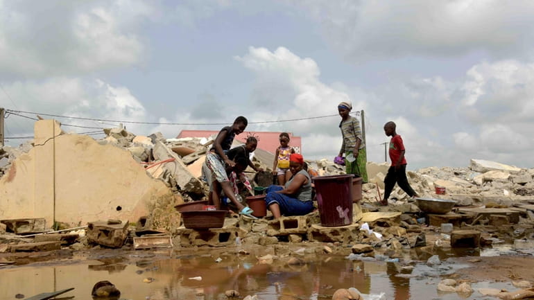 People whose houses were demolished on public health grounds collect...