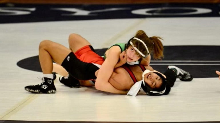 Sophomore Ashley Diaz, a wrestler from Seaford is the first...