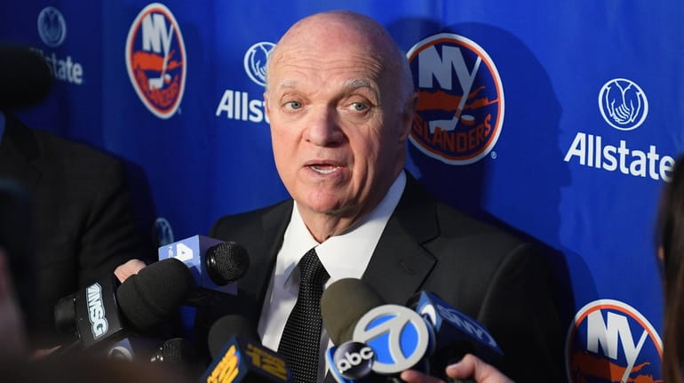 New York Islanders general manager Lou Lamoriello speaks with the...