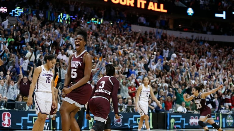 FILE -Mississippi State center Teaira McCowan (15) celebrates after watching...
